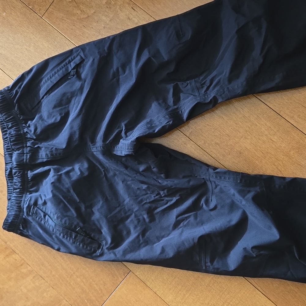 REI rain pants size small